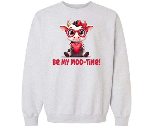 Gildan Softstyle Be My Moo-Tine! Valentine's Day Sweatshirt in the color Ash Grey with a cute graphic of a baby cow wearing fashionable glasses and holding a red heart.