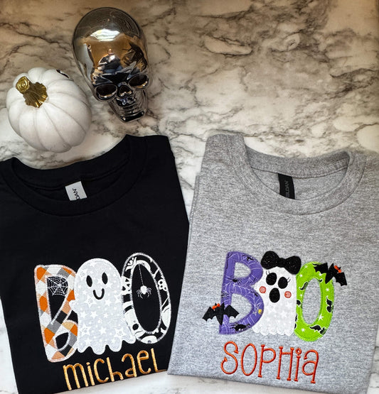 Matching Halloween t-shirts for kids with the word "Boo" embroidered on them with coordinating Halloween themed fabrics.  Each shirt can be personalized with a child's name.