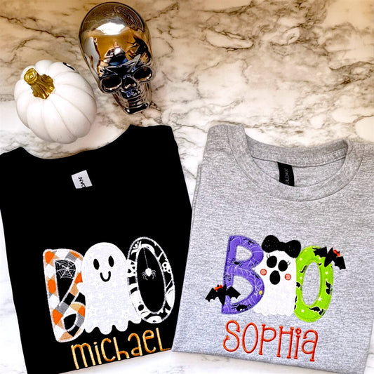 Matching Halloween t-shirts for kids with the word "Boo" embroidered on them with coordinating Halloween themed fabrics. Each shirt can be personalized with a child's name.