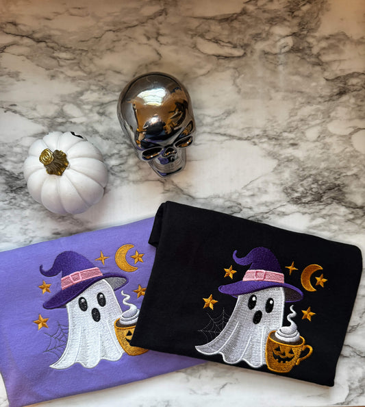 Comfort Colors T-Shirt with embroidered cute ghost with a witch hat and Halloween themed coffee.  Design comes on either a violet or black shirt of your choice.
