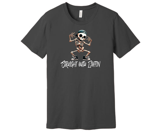 Bella Canvas T-Shirt in the color Asphalt with a Skeleton showing off his dance moves and the words "Straight Outta Coffin" underneath.