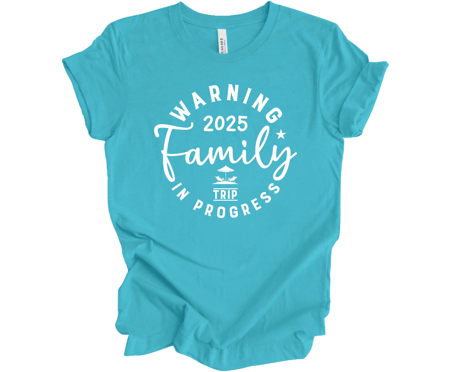 Bella Canvas T-shirt in Turquoise with the saying Warning Family Trip in Progress 2025