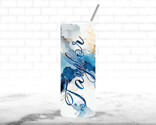 20oz Skinny Tumbler in a watercolor design in the colors white, different shades of blue and slight golden color personalized with your name in a font of your choice