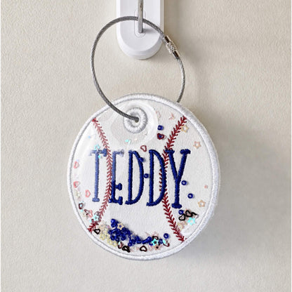 Personalized embroidered baseball bag tag on a stainless steel twist closure ring.  Can be personalized with name and jersey number.  Can also add matching ribbons.