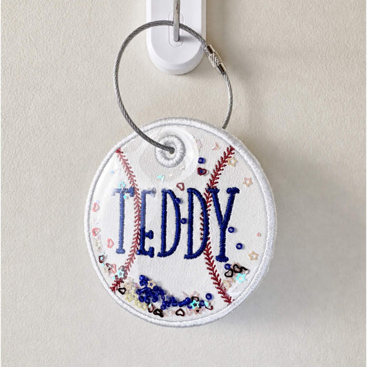Personalized embroidered baseball bag tag on a stainless steel twist closure ring.  Can be personalized with name and jersey number.  Can also add matching ribbons.