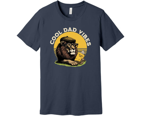 Bella Canvas T-Shirt in Vintage Navy with the words Cool Dad Vibes and an image of a lion with a newsboy cap and glasses reading the book "The Dad Code"