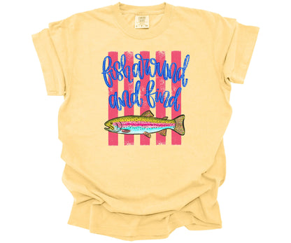 Hand-drawn trout fish graphic with hot pink horizontal lines and script text saying: "Fish Around and Find Trout" on a premium Comfort Colors T-shirt in the color Butter.