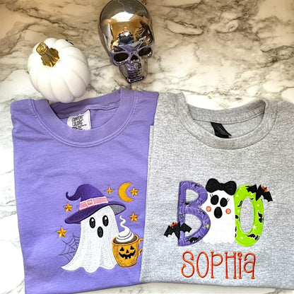 Comfort Colors Adult T-Shirt with an embroidered ghost on the color violet.  Girl's Boo applique embroidered halloween design personalized with child's name on a Gildan Youth tee in the color sports gray.