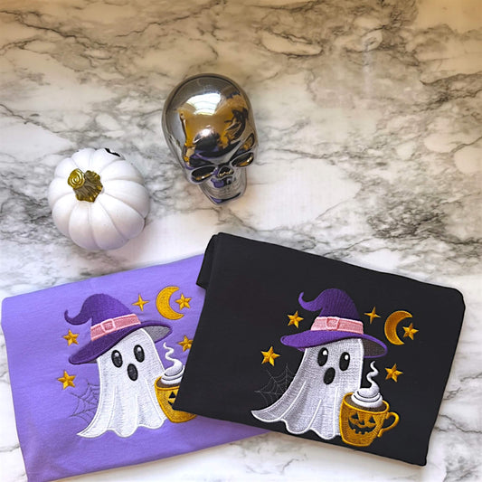 Comfort Colors T-Shirt with embroidered cute ghost with a witch hat and Halloween themed coffee.  Design comes on either a violet or black shirt of your choice.