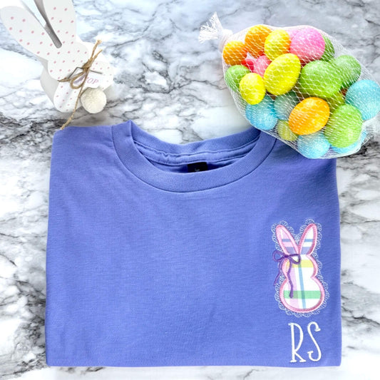 Kid's Gildan Embroidered T-Shirt in the color Violet with a cute applique bunny on the left chest, featuring a delicate lace border and coquette bow and spring colored fabrics.  The shirt can be personalized by adding your child's initials underneath the bunny.