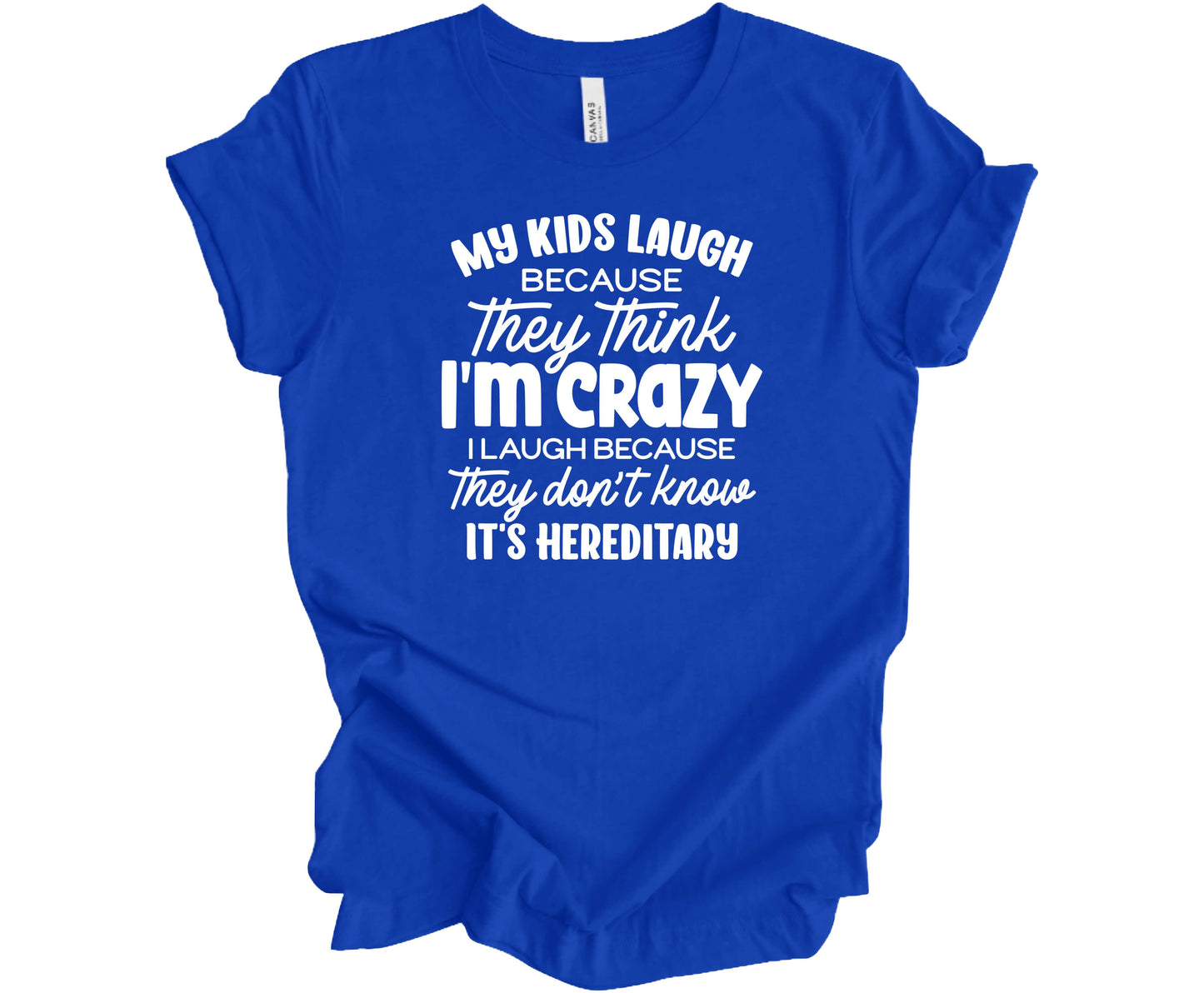 Bella Canvas T-Shirt in True Royal with the funny saying "My Kids Laugh because they think I'm Crazy I laugh because they don't know its hereditary"