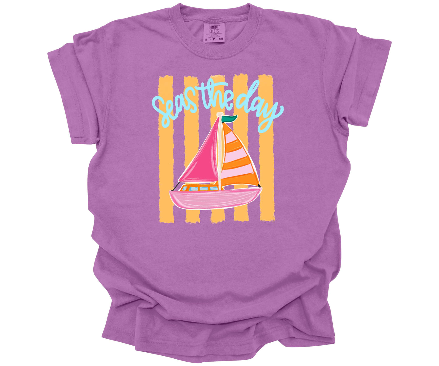 Inspirational "Seas the Day" graphic design with a hand-drawn sailboat on yellow horizontal stripes on a Comfort Colors Tee in the color Neon Violet.