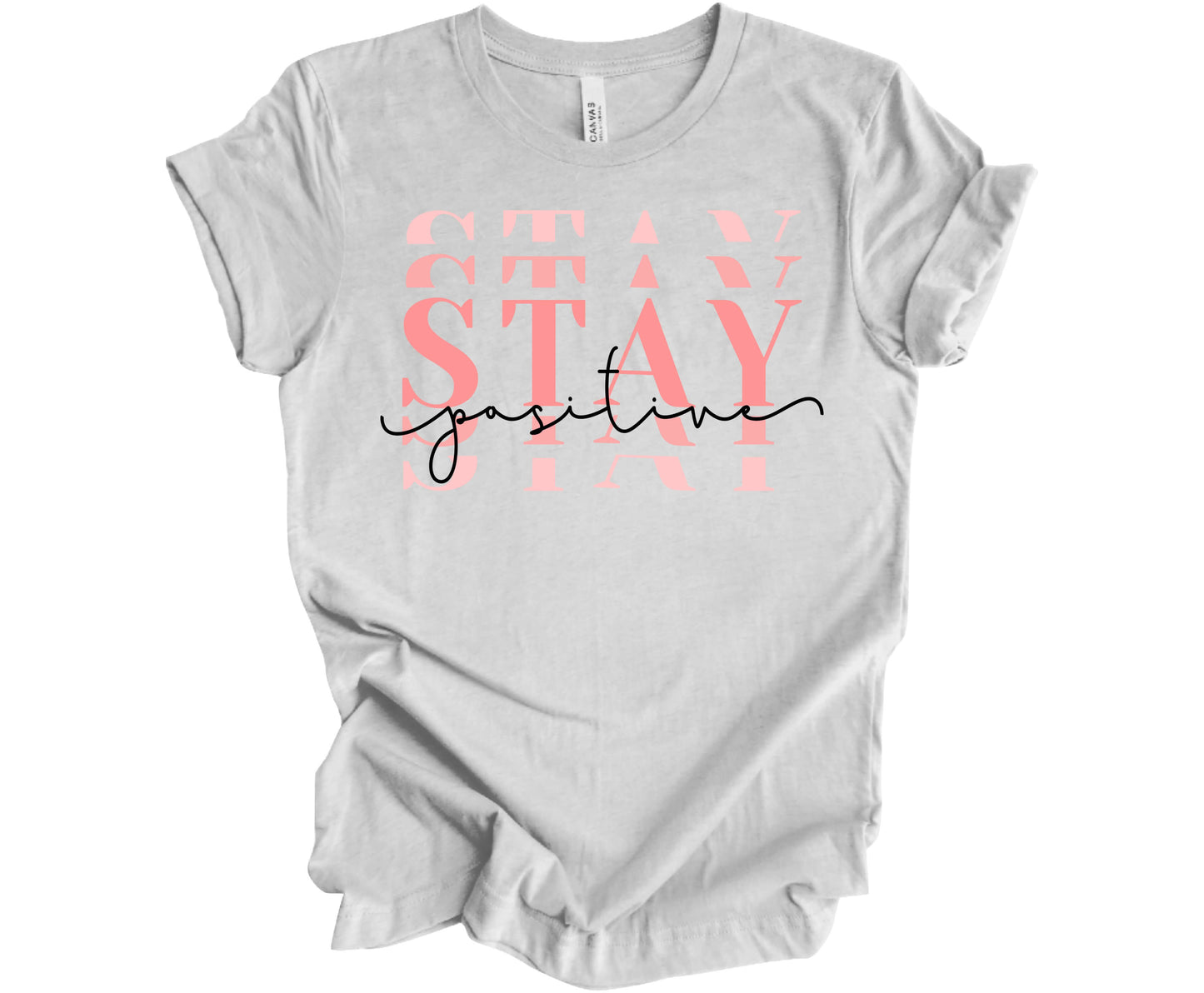 Bella Canvas T-Shirt in Ash with the word Stay (Stacked) and the word Positive across it.