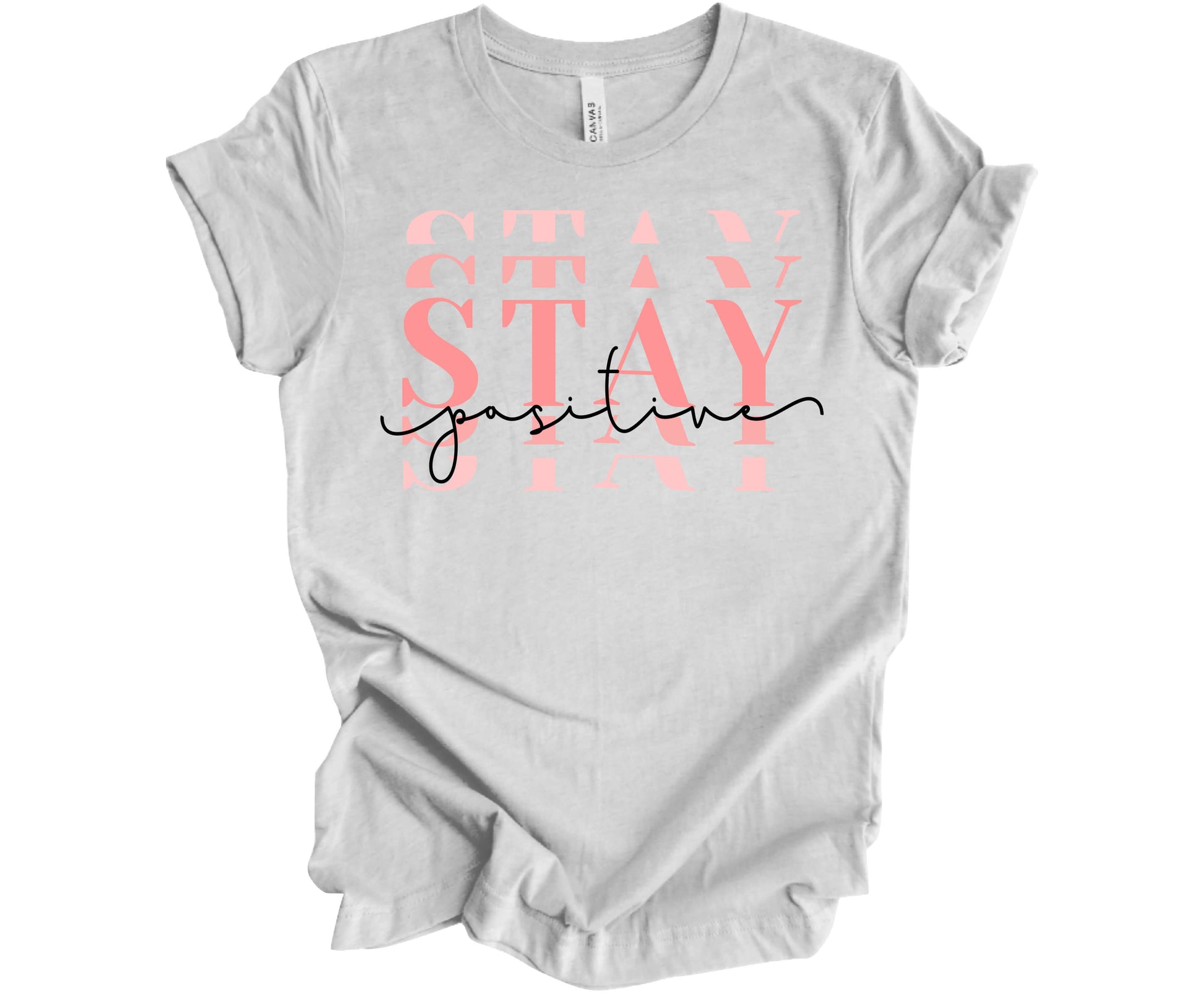 Bella Canvas T-Shirt in Ash with the word Stay (Stacked) and the word Positive across it.