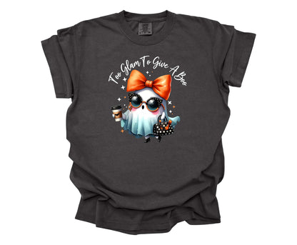 Too Glam to Give a Boo Halloween Comfort Colors T-shirt in the color Pepper with cute ghost wearing sunglasses, purse and high heels.