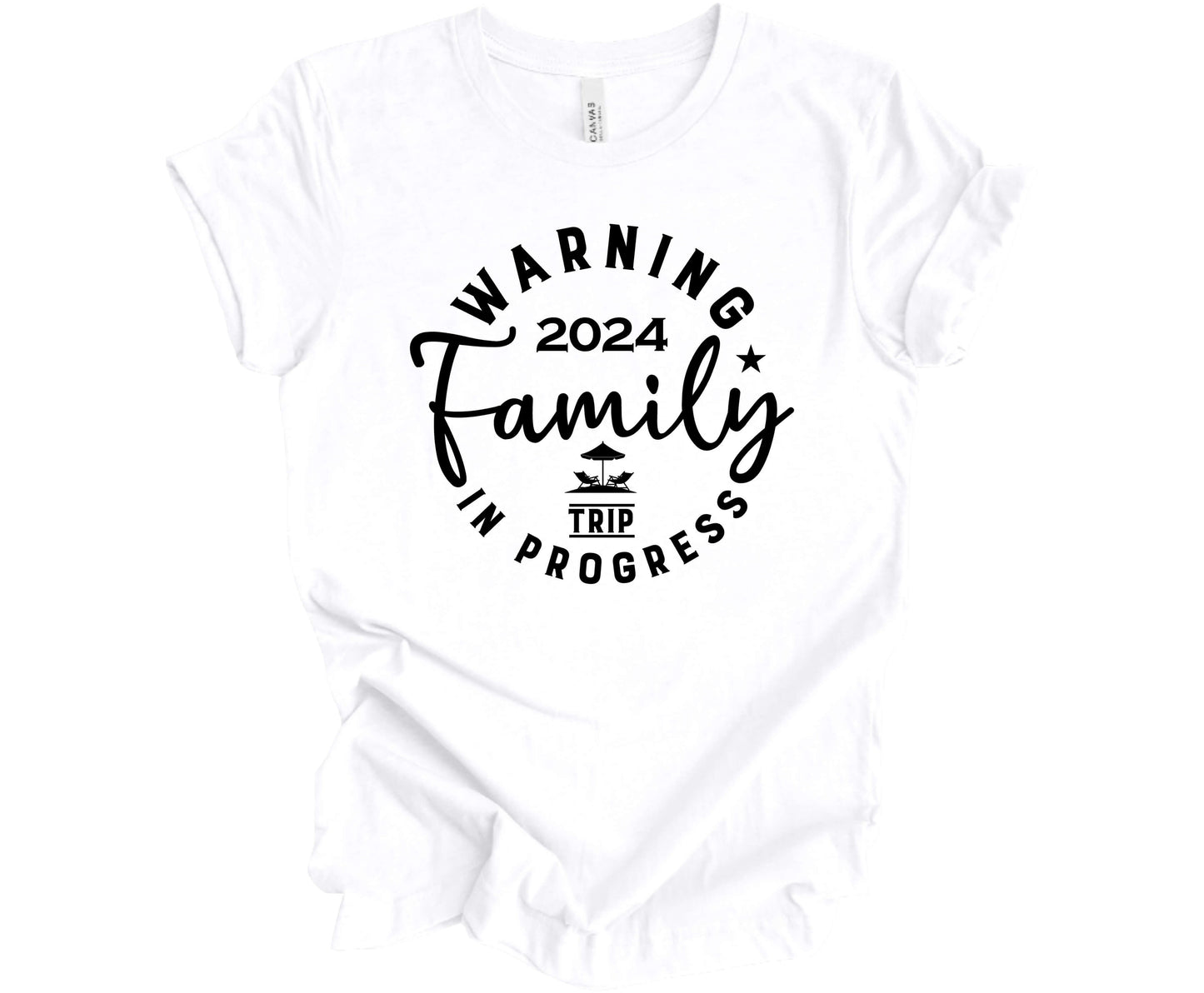 Bella Canvas T-shirt in White with the saying Warning Family Trip in Progress 2024