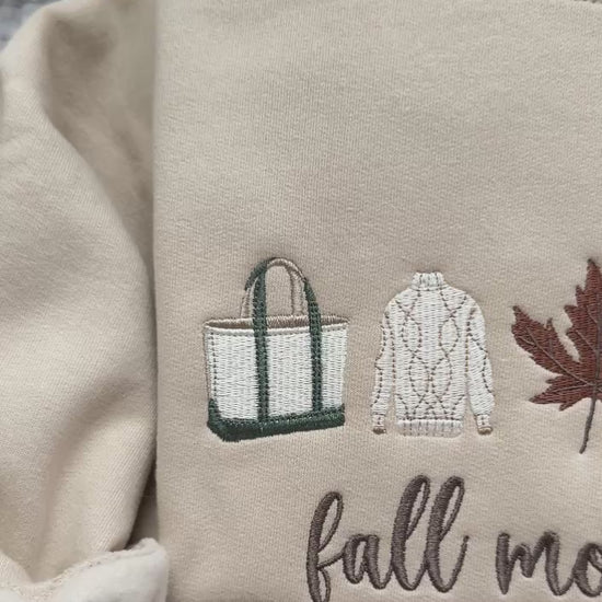 Close-up video showing the embroidery  on the our Fall Mornings sweatshirt.